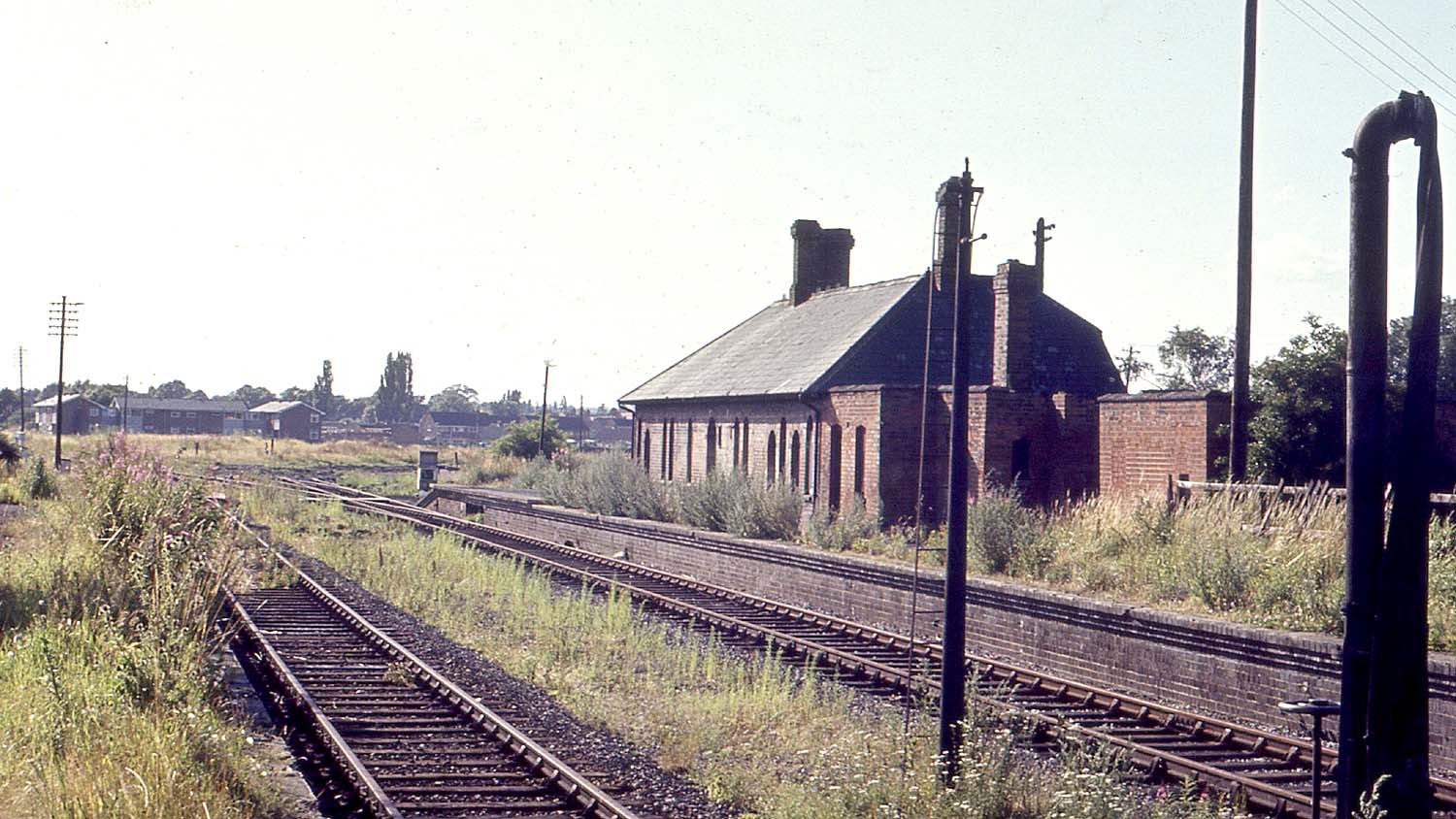 Looking along the former down platform towards the former track bed to Broom and the junctions with the GWR