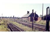 Looking along the former down platform towards the former track bed to Broom and the junctions with the GWR