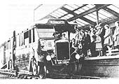 Passengers prepare to board the Ro-Railer during one of its fare-paying tests in April 1932