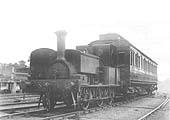 An oblique view of E&WJR 0-6-0ST No 1 and the GWR Clerestory Coach standing on the exchange line adjacent to the coal sidings