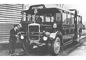 A member of the LMS' staff checks the Ro-Railer's temporary buffing heads and a draw hook