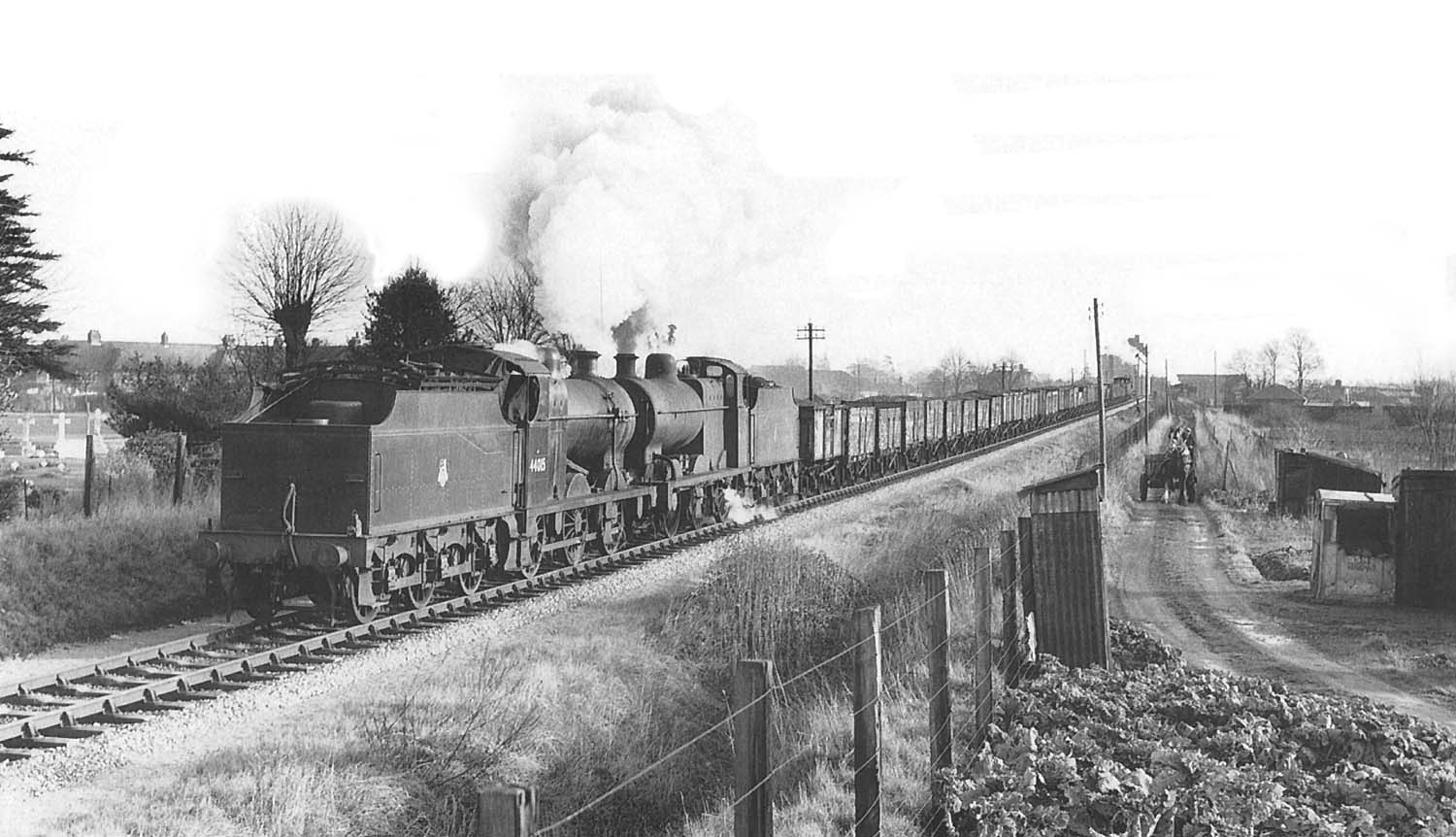 Ex-LMS 4F 0-6-0 No 44175 running tender first pilots classmate No 44015 on a Class K freight service to Broom