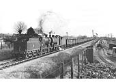Ex-LMS 4F 0-6-0 No 44175 running tender first pilots classmate No 44015 on a Class K freight service to Broom