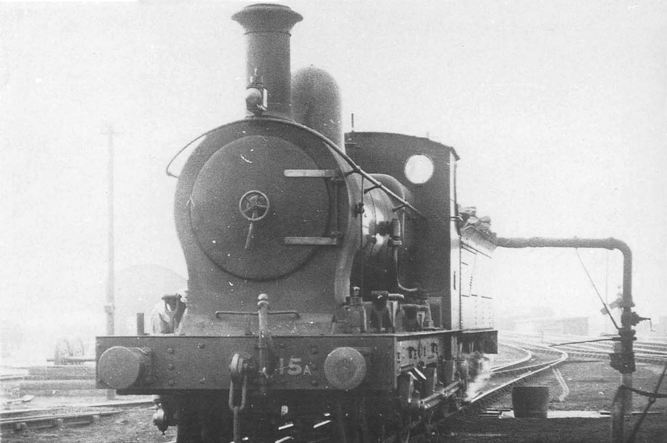 Ex-E&WJR 0-6-0 No 15 is seen taking on water outside Stratford upon Avon's shed on a winters day