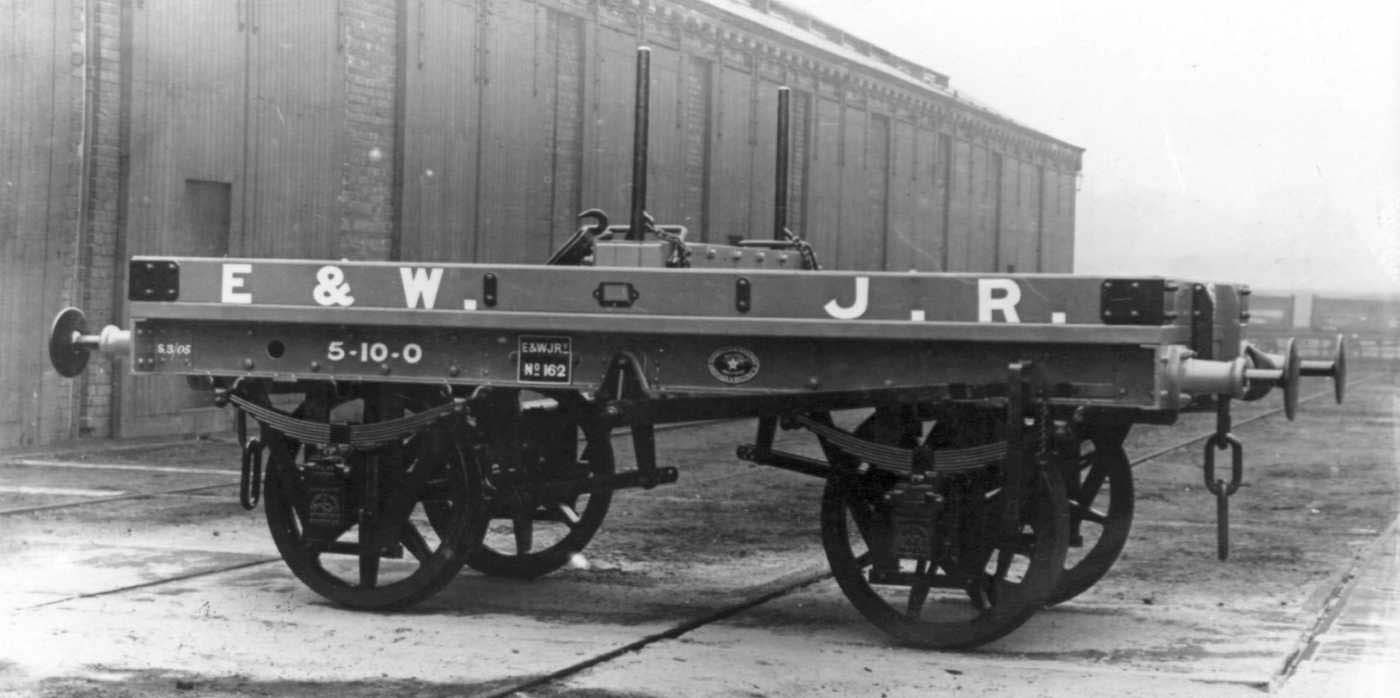An official photograph of a timber bolster wagon circa 1903-4 time which shows the EWJR carriage livery very well