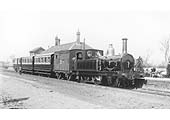 E&WJR 2-4-0T No 1 standing at the head of a three coach local passenger train bound for Towcester