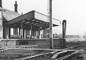 Close up showing Stratford on Avon station's up platform and the various furniture, posters and architecture