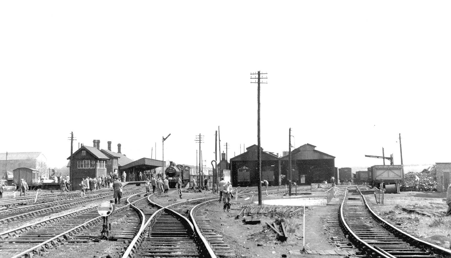 A panoramic view of station looking Eastwards with the shed on right and the station on the left