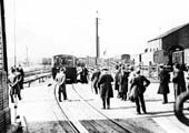 The Ro-Railer is seen reversing on to the ramp where it can lower its road wheels to proceed by road