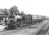 Ex-E&WJR 0-6-0 No 18, now in SMJ guise heads a special train of GCR stock conveying the American Ambassador