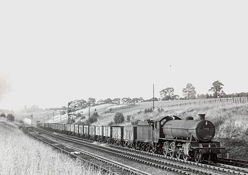 An unidentified O1 2-8-0 locomotive has just cleared Catesby Tunnel and is about to pass Charwelton on an up goods