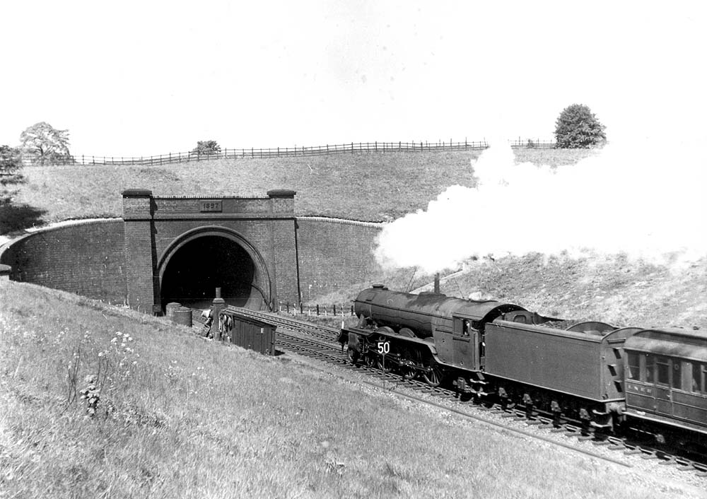 An unidentified ex-LNER 4-6-2 class A3 locomotive enters Catesby Tunnel at speed with a down Manchester express