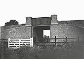 A plate girder occupation overbridge carrying the London Extension over a farm track south of Willoughby