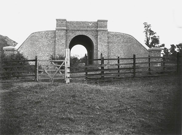 Built in advance of the embankment is a completed brick arch occupation underbridge over a pathway