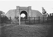 Built in advance of the embankment is a completed brick arch occupation underbridge over a pathway
