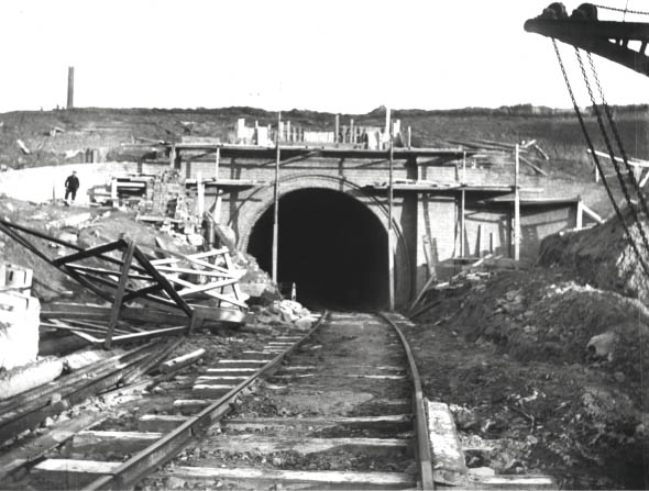 Looking along the contractor's temporary track towards the near completed southern portal of Catesby tunne