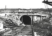 Looking along the contractor's temporary track towards the near completed southern portal of Catesby tunne