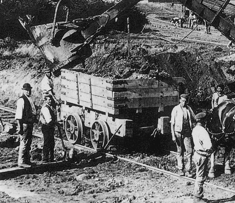 Close up showing the contractor's wagon used to carry the spoil away from the excavation area