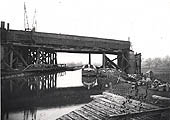 A later view of the bridge being built to cross the Oxford Canal showing the steel beams nearly complete