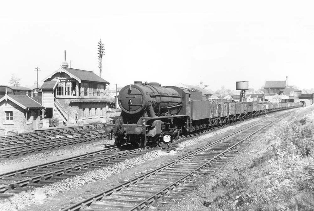 Ex-WD 2-8-0 No 90103 passes through Rugby station whilst on a long up goods train on 13th May 1950