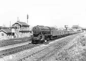 Ex-WD 2-8-0 No 90103 passes through Rugby station at the head of a goods train