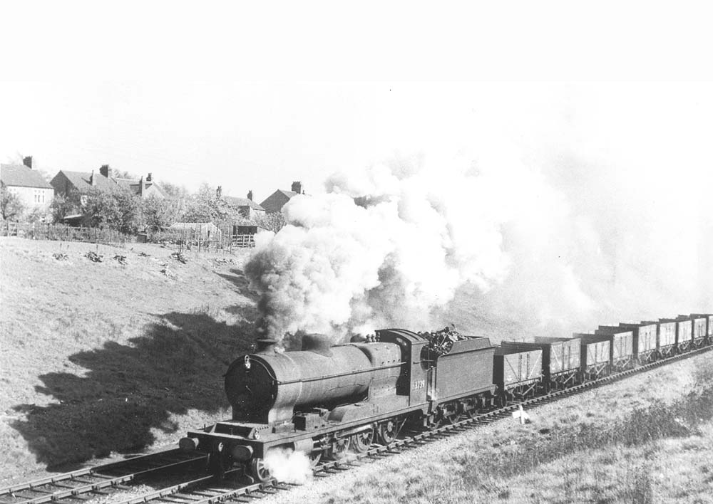 Ex-ROD 2-8-0 Class O4/3 No 63739 is seen on an up mineral train approaching Rugby station