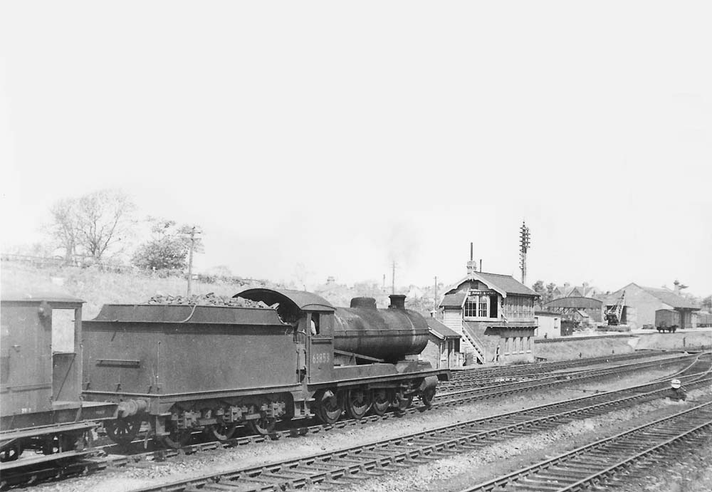 Ex-ROD 2-8-0 Class O4/8 No 63853 approaches Rugby Signal Box on a down goods service on 29th May 1950