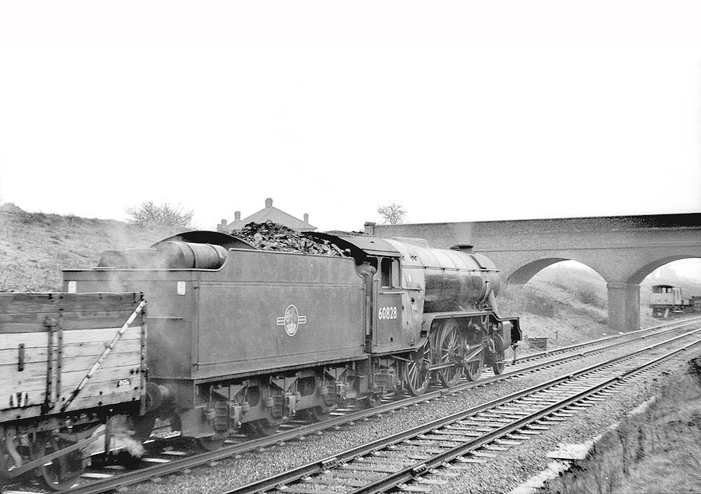 Ex-LNER 2-6-2 class V2 No 60828 is seen approaching Rugby with a down freight on 11th April 1963