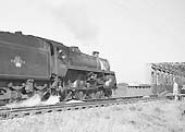British Railways Class 5 4-6-0 No 73000 heads across the GCR's Birdcage bridge on 12th October 1963