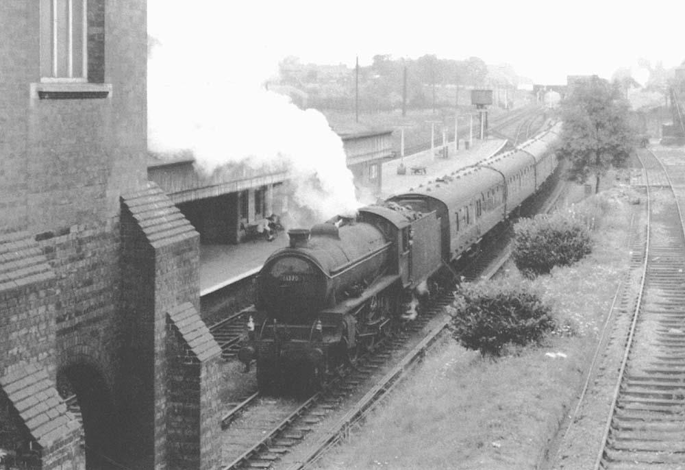 British Railways built 4-6-0 B1 No 61370, carrying Class A headcodes, stands in the down refuge siding in August 1959