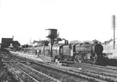 Ex-LMS 5MT 4-6-0 No 44847 is seen taking on water at Rugby Central station on 15th July 1966