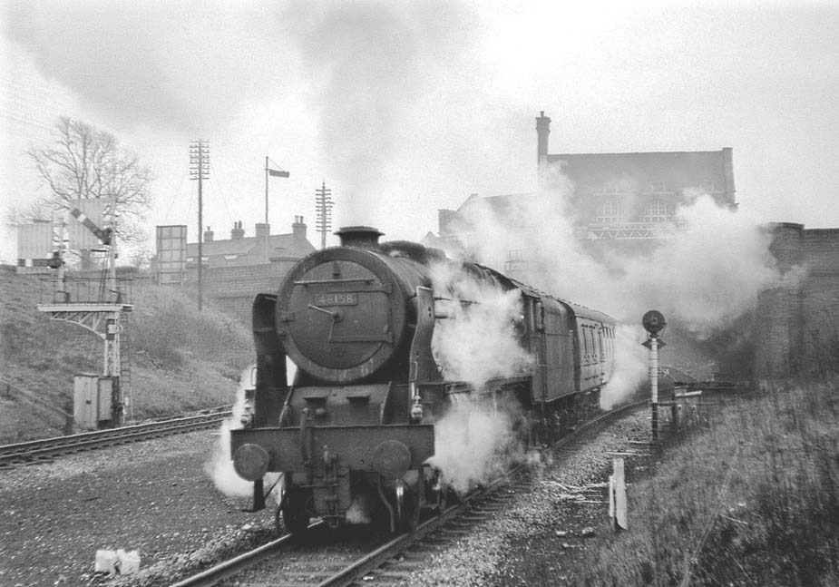 Ex-LMS 4-6-0 Royal Scot Class No 46158 'The Loyal Regiment' leaves Rugby Central with the evening Marylebone to Nottingham Victoria service