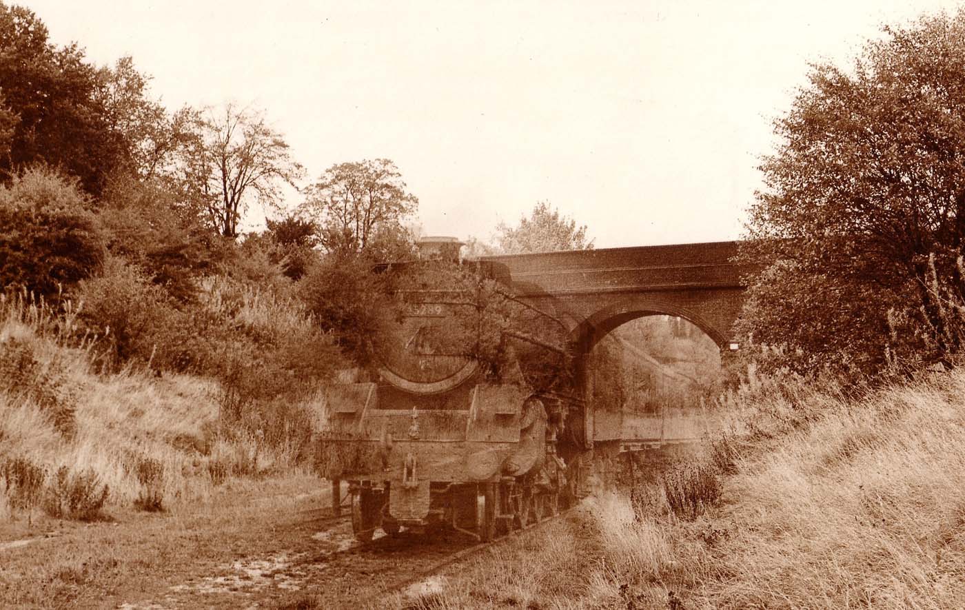 Ex-LMS 5MT 4-6-0 No 45289 passes Bridge 454 as it approaches Rugby Central on 13th August 1966