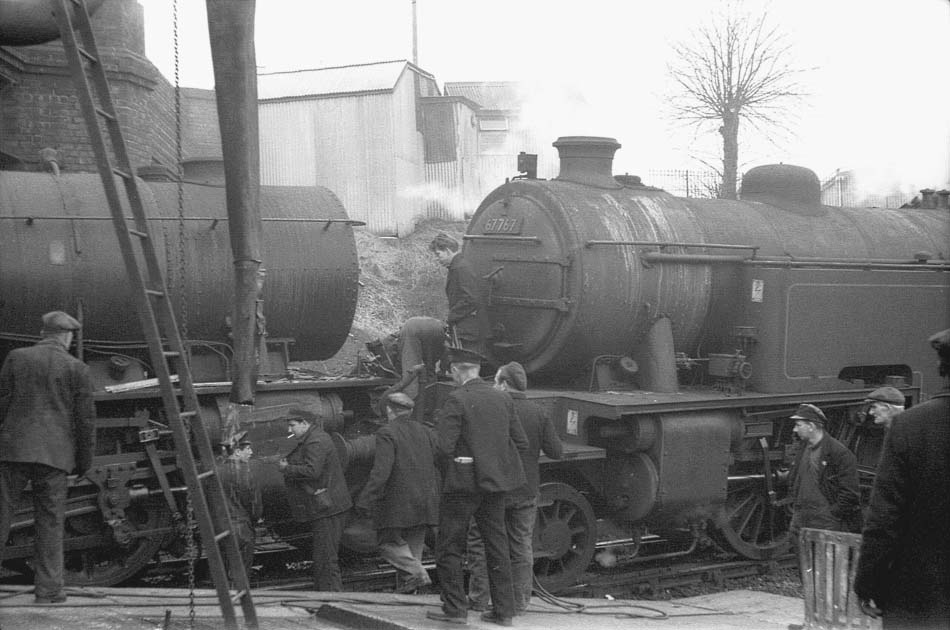 British Railways built L1 2-6-4T No 67767 has been rammed by Austerity 2-8-0 No 90697 when leaving the refuge siding