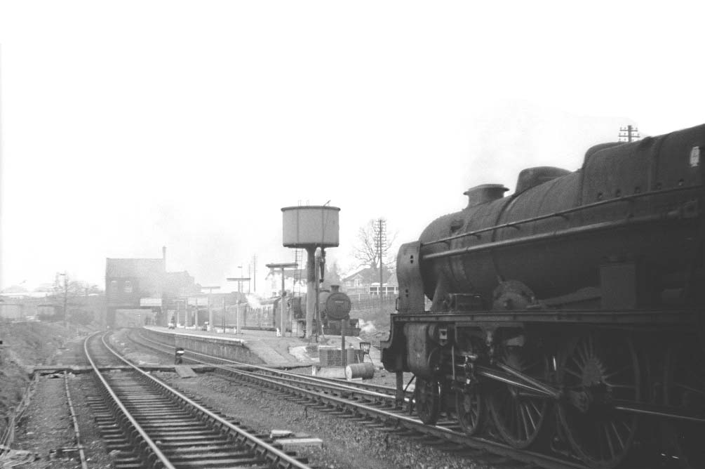 Ex-LMS 'Rebuilt Royal Scot' 4-6-0 No 46111 'Royal Fusilier' approaches Rugby Central at with a down express