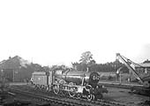 Ex-GWR 'Modified Hall' 4-6-0 No 6976 'Graythwaite Hall' stands in Rugby Central's goods yard having just shunted a single fish van