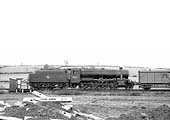 Ex-LMS 8F 2-8-0 No 48002 is seen assisting with major Permanent Way relaying work south of Rugby on Sunday 19th May 1963