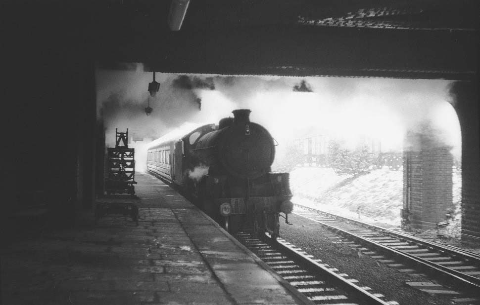 A grimy ex-LNER B1 4-6-0 No 61205 restarts at 2:00pm with a northbound local on Thursday 31 January 1963