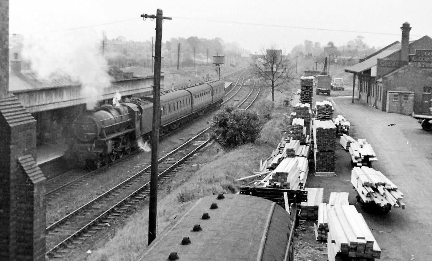 A grimy and unidentified ex-LMS 5MT 4-6-0 locomotive stands at Rugby Central with the down local to Nottingham Victoria in 1966
