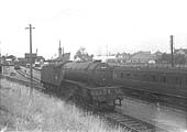 Ex-LNER V2 2-6-2 No 60925 is seen attaching a second brake van to the rear of a coal train on Thursday 3rd August 1961
