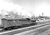 Ex-ROD 2-8-0 class O4/3 No 63639 passes through Rugby's Great Central station with a down goods train