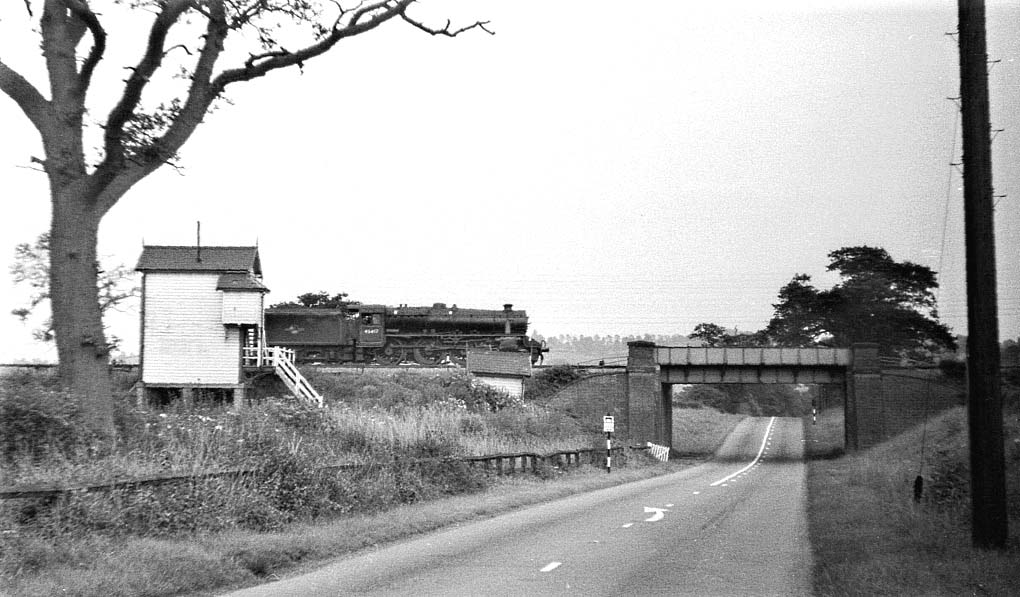 Looking eastwards as a clean ex-LMS 5MT 4-6-0 No 45417 sweeps southward past Staverton Road Cabin