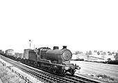 Ex-ROD 2-8-0 Class O4/3 No 3862 is seen at the head of a long freight service in June 1948