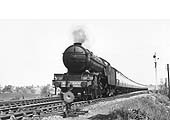 LNER 2-6-2 Class V2 No 4830 heads a down passenger train past the down refuge siding near Staverton Road