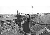 LNER 2-6-2 Class V2 No 4830 heads a down passenger train over Staverton Road bridge in March 1948