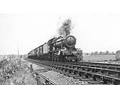 Ex-GWR 4-6-0 Hall Class No 6990 'Witherslack Hall' heads a down express during the 1948 locomotive exchanges