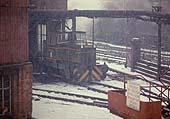 Hunslet diesel-hydraulic 0-4-0, Works No 6982, 'Longbridge' stands outside one of Longbridge's sheds