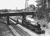 Ex-Great Western Railway 4-6-0 60xx 'King' class locomotive No 6006 'King George I' sweeps past Avon Bridge Power Station