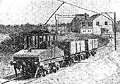 View of the Power Station's overhead electric locomotive in front of the power station in its initial form