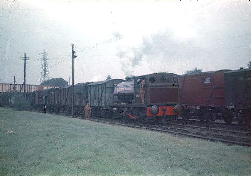 View of Cadbury Bournville 0-4-0ST No 10 shunting vent vans at Cadbury's exchange sidings on 12th October 1956
